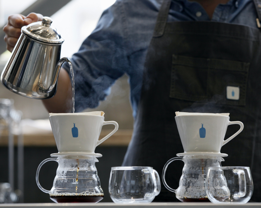 A barista brews coffee at a Blue Bottle Coffee shop in Tokyo. A study examined caffeine intake among women age 65 and older.