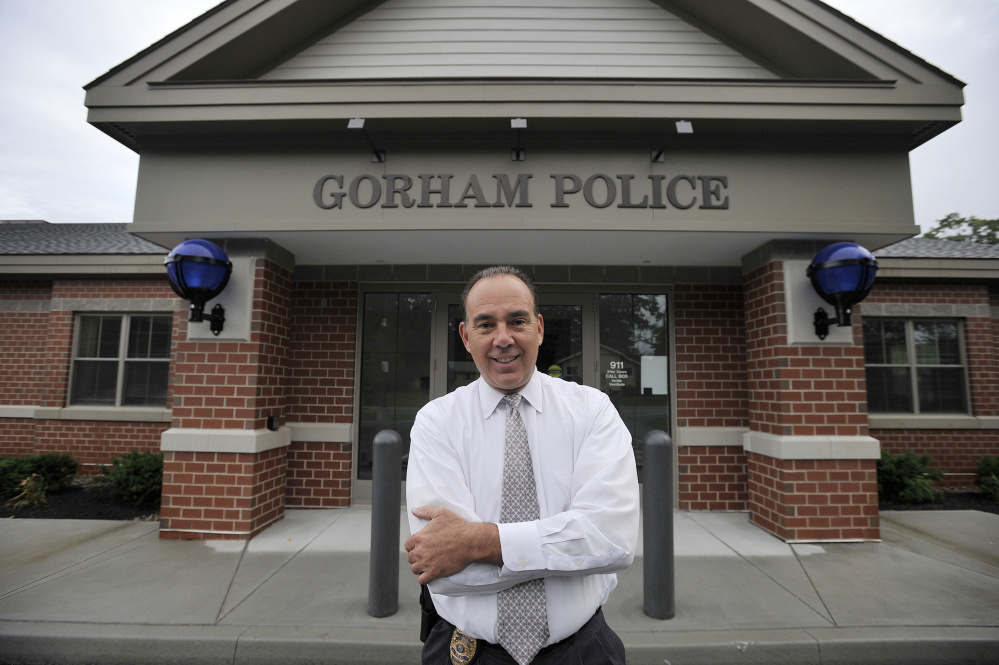 Gorham police chief Dan Jones stands outside the new public safety building. He believes morale is great now because it's easier for officers to get their work done.