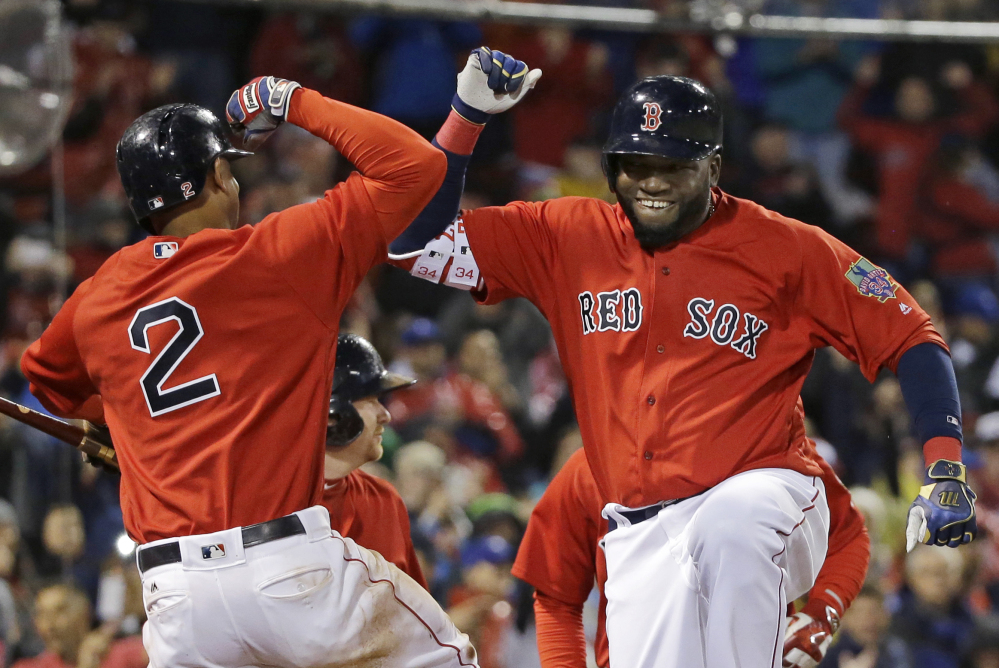 David Ortiz celebrates his two-run home run with Xander Bogaerts in the seventh inning Friday night at Fenway Park.