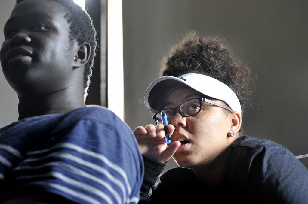 Ochan Ogak, left and Tasha Tracy, both juniors in Sally Reagan's Modern US and World History class at Portland High School, pay attention as the class discusses terrorism on Thursday, Sept. 8. (Photo by Shawn Patrick Ouellette/Staff Photographer)