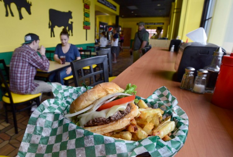 The 1/4-pound burger and fries combo was part of the menu Thurston's Wicked Good Burgers in Portland. The Forest Avenue restaurant has closed. John Patriquin/Staff Photographer