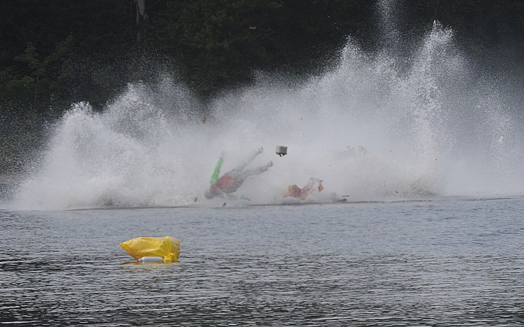 One of the racers goes airborne during a fatal crash on Saturday,  during the Bill Giles Memorial Regatta on Watson Pond in Taunton, Mass. 
Mike Gay/The Daily Gazette via AP