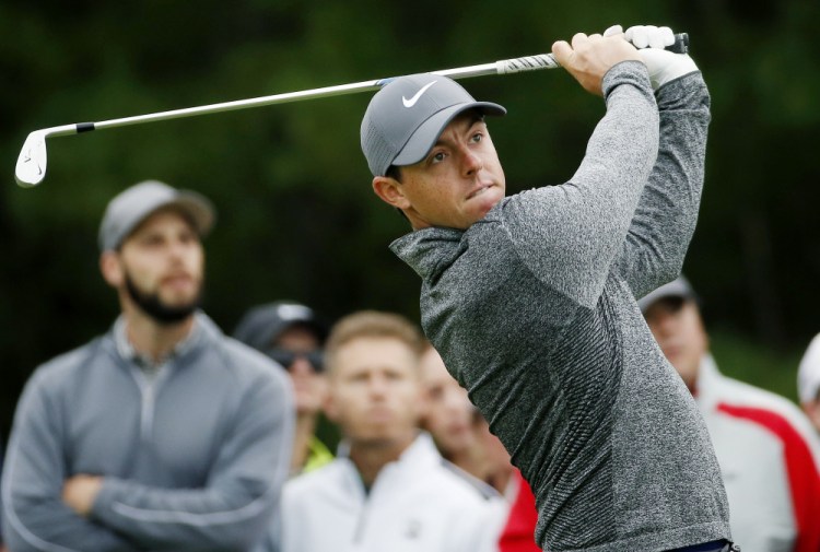 Rory McIlroy of Northern Ireland tees off on the third hole during the final round of the Deutsche Bank Championship golf tournament in Norton, Mass., on Monday. (AP Photo/Michael Dwyer)