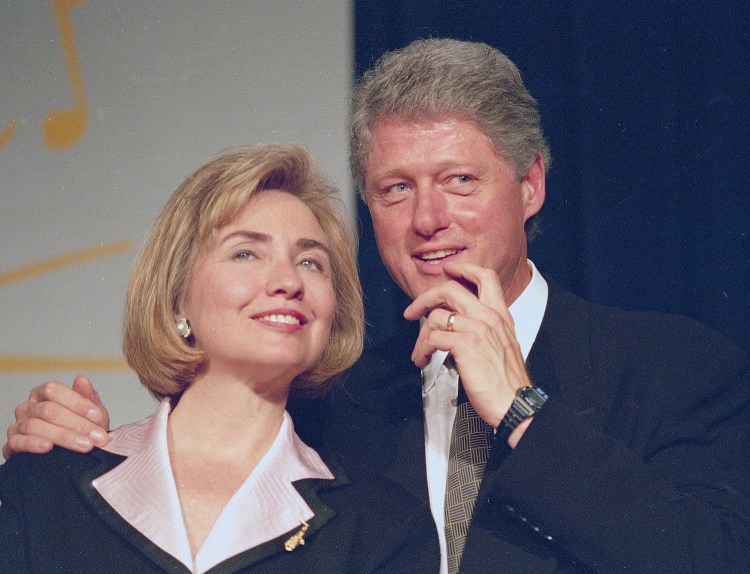 President Bill Clinton and first lady Hillary Rodham Clinton are shown in 1994, the year former Arkansas state employee alleged in a lawsuit that Bill Clinton groped her three years earlier.