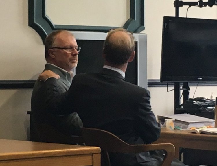 David Brown, left, and his attorney Allan Lobozzo react after Brown was found not guilty by a jury Tuesday in connection with the fatal hayride crash that killed Cassidy Charette in 2014.