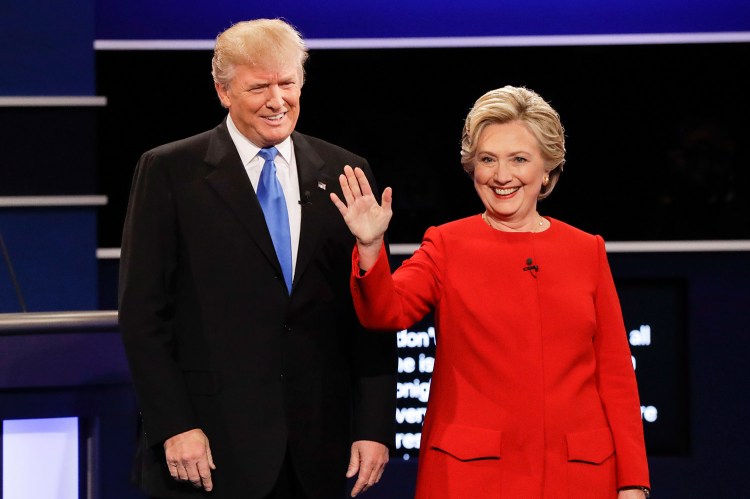 Republican presidential nominee Donald Trump and Democratic presidential nominee Hillary Clinton are introduced during the presidential debate at Hofstra University in Hempstead, N.Y., Monday. Trump maintained that the Democratic nominee did not unnerve him, but he admitted that he was irritated "at the end, maybe."
