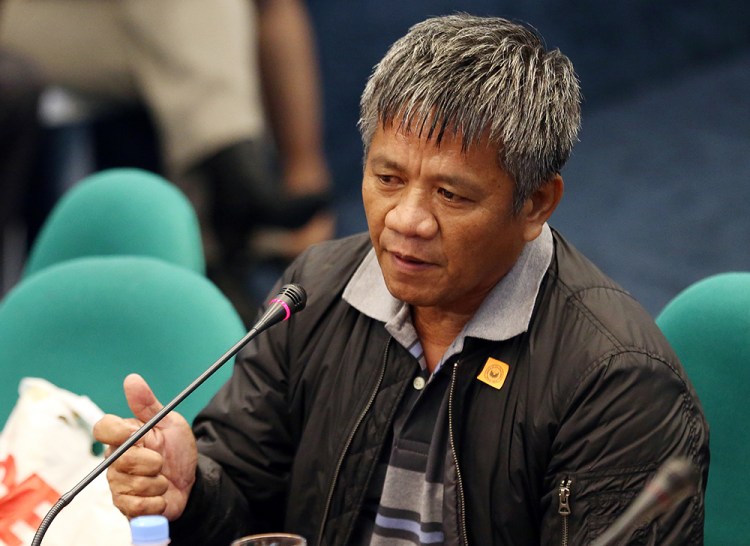 Former Filipino militiaman Edgar Matobato testifies before the Philippine Senate on Thursday. Matobato said that President Rodrigo Duterte, when he was still a city mayor, ordered him and other members of a squad to kill criminals and opponents in gangland-style assaults. <em>Aaron Favila/Associated Press</em>