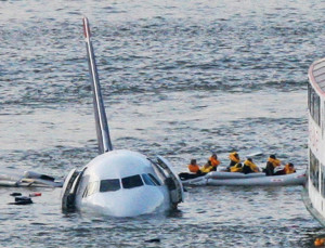 Passengers in an inflatable raft move away from the Airbus 320 US Airways aircraft that went down in the Hudson River in New York on Jan. 15, 2009. Bebeto Matthews/Associated Press