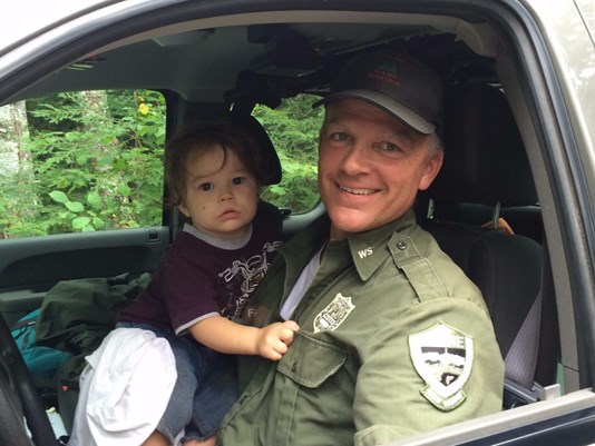 Maine Game Warden Jim Fahey found a missing 18-month-old boy about half a mile from his home in Bradford after the boy wandered away.