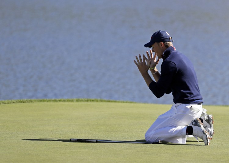 Jordan Spieth of the United States reacts after missing a long putt on the 17th hole during a foresomes match at the Ryder Cup golf tournament on Saturday at Hazeltine National Golf Club in Chaska, Minn.