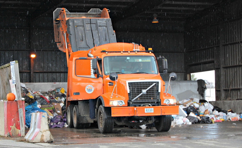 Garbage is emptied at the Oakland transfer station, where trash later goes to the Penobscot Energy Recovery Corp. in Orrington, but in 2018 it will go to a new waste-to-energy Fiberight plant in Hampden.