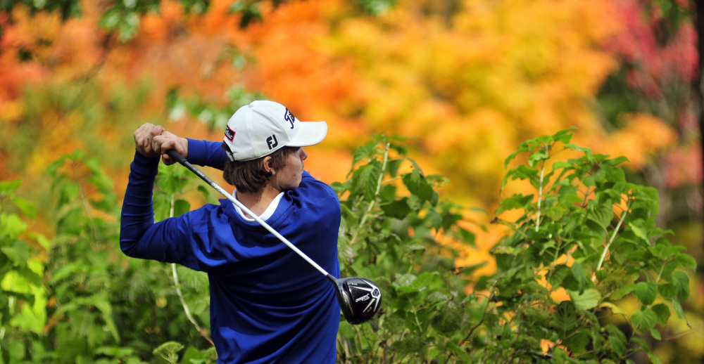 Joe Phelan/Kennebec Journal
Erskine Academy golfer Connor Paine tees off on Arrowhead's 18th hole during state team golf championship on Saturday at Natanis Golf Course in Vassalboro.