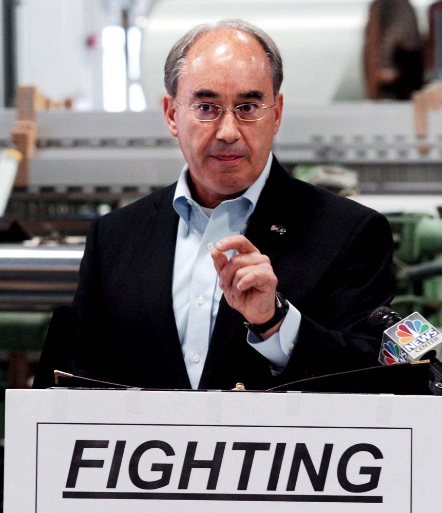 U.S. Rep. Bruce Poliquin, R-2nd District, makes a point about fair trade Aug. 30 at Auburn Manufacturing.