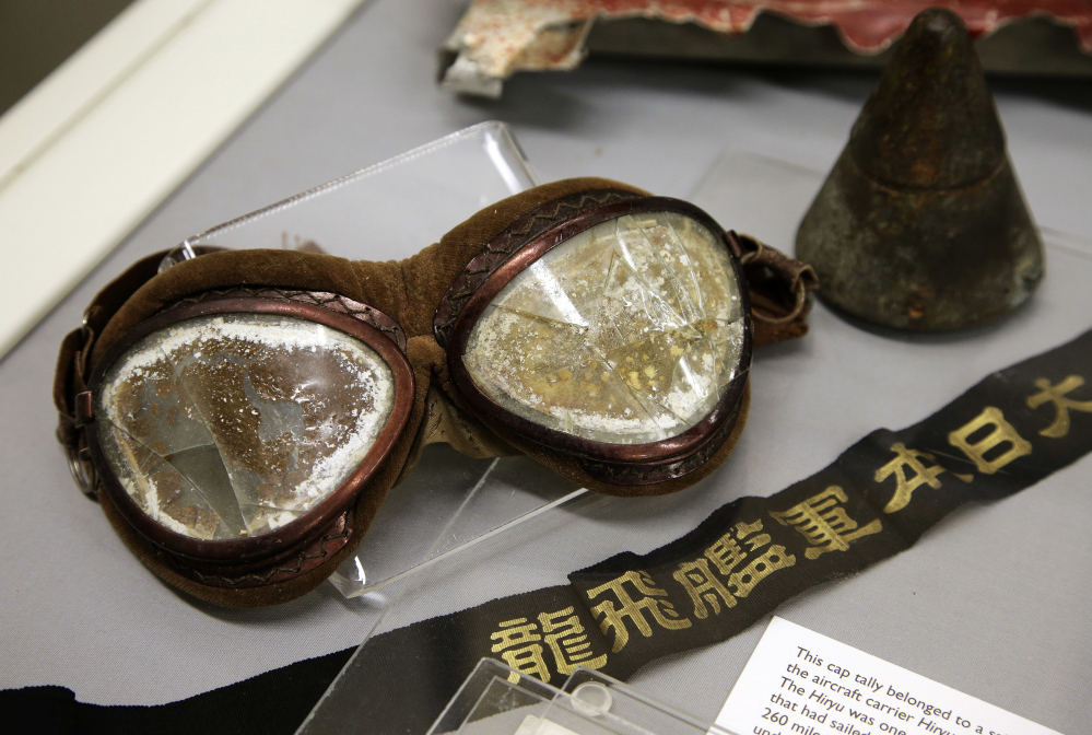 A pair of goggles once worn by a Japanese pilot in the Dec. 7, 1941 attack on Pearl Harbor is on display part of an exhibit at The Museum of World War II in Natick, Mass. The new exhibition, which opened Saturday features artifacts that have rarely been publicly displayed.