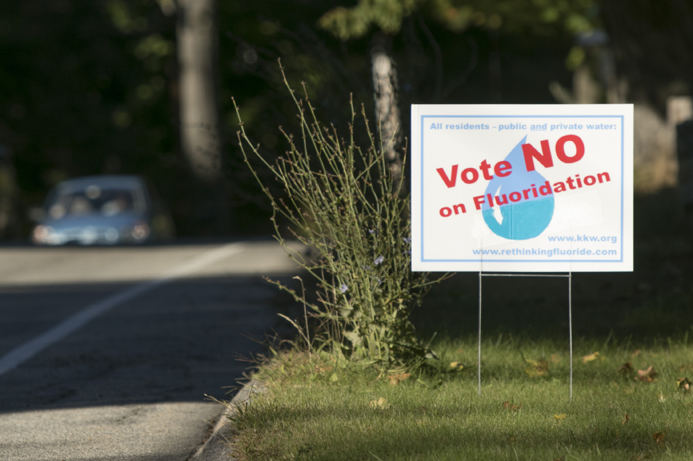 KENNEBUNK, ME - OCTOBER 5: Signs have sprung up on roadsides urging a no vote on a referendum asking residents in seven towns served by the Kennebunk, Kennebunkport and Wells Water District if they want to continue adding fluoride to drinking water. A forum will be held Monday in Kennebunk to discuss the upcoming referendum. (Photo by Gregory Rec/Staff Photographer)