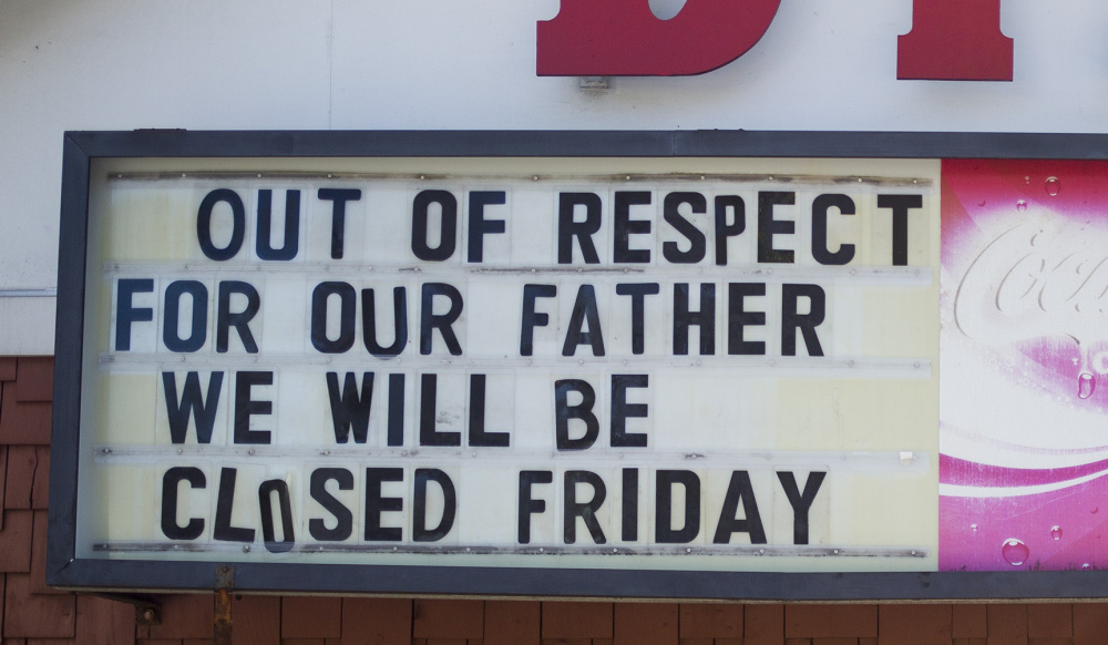 The sign outside DiPietro's Market lets customers know that the store will be closed for Santo "Sam" DiPierto's funeral on Friday.