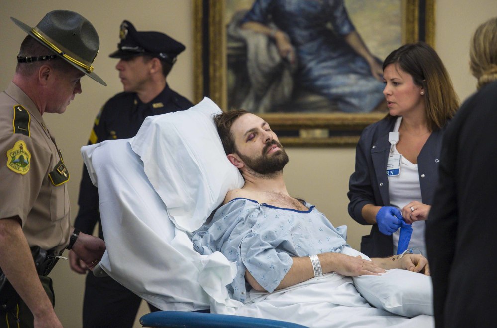Steven Bourgoin is arraigned in a makeshift courtroom at the University of Vermont Medical Center on five counts of second-degree murder in Burlington, Vt., on Friday. He pleaded not guilty of driving the wrong way on an interstate and causing a fiery crash that killed five teenagers and critically injured himself.