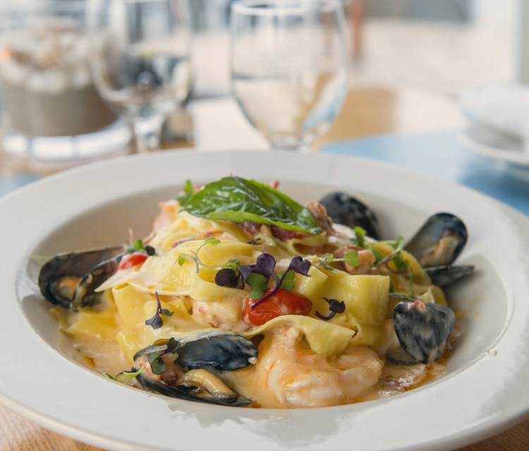 Everything comes together in the seafood pappardelle. John Ewing/Staff Photographer
