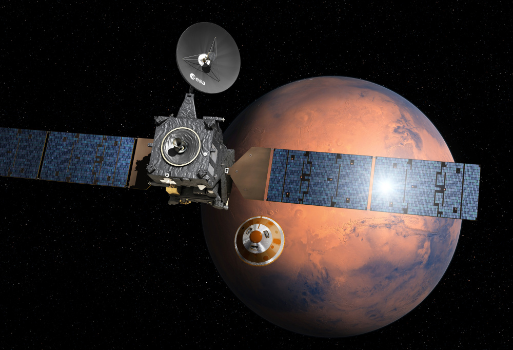 An artist's impression depicts the separation of the European Space Agency probe named Schiaparelli, center, from the Trace Gas Orbiter, left, to descend to Mars. Schiaparelli is set to enter the atmosphere of Mars on Wednesday at a speed of nearly 13,000 mph.
