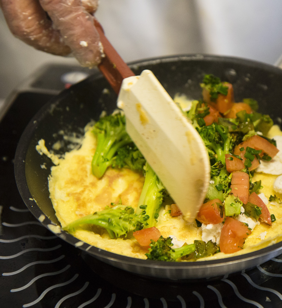 A gourmet omelet is prepared.