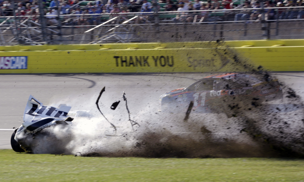 Brad Keselowski spins into the infield at Kansas Speedway on Sunday. The crash led to a 38th-place finish for Keselowski, dropping him to 11th in the standings ahead of Sunday's race at Talledega, where a field of 12 will be pared to eight drivers.