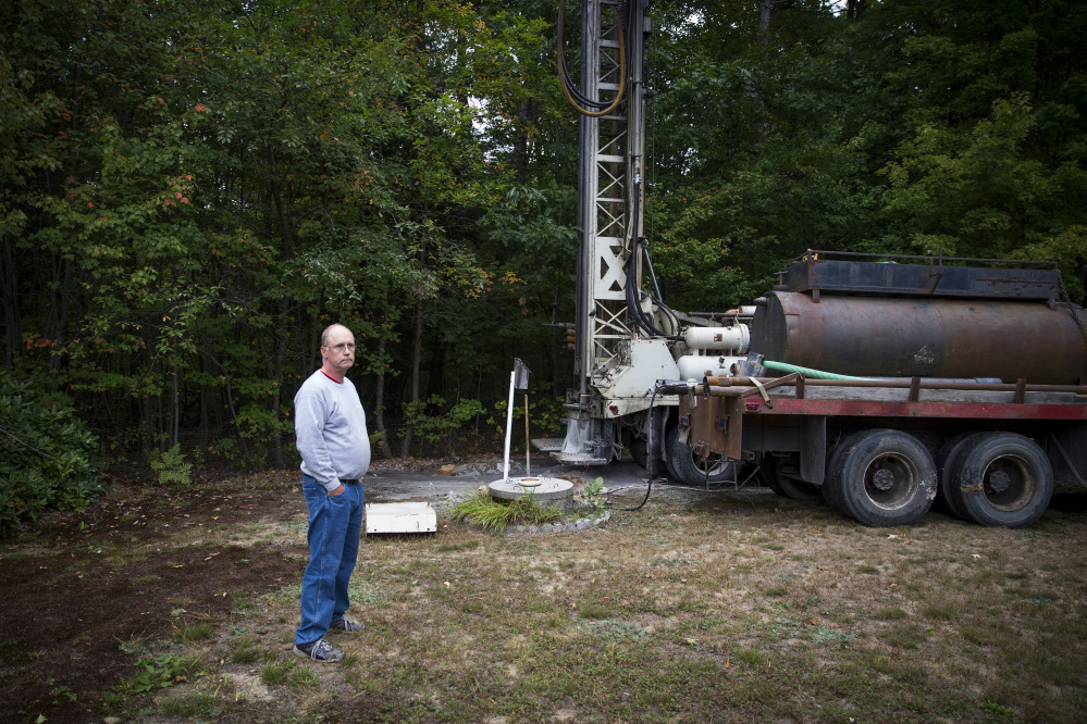 With a new well being drilled on his Standish property this fall, Bob Boynton stands near the concrete casing of his shallow dug well, which had run dry. While news coverage has focused on the last six months of below-average rain in Maine, this is a dry spell that's been several years in the making.