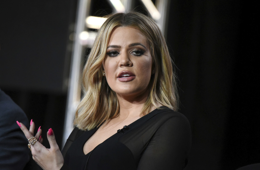Khloe Kardashian defends her sister Kim Kardashian West against criticism that she had been too public in displaying her wealth.
