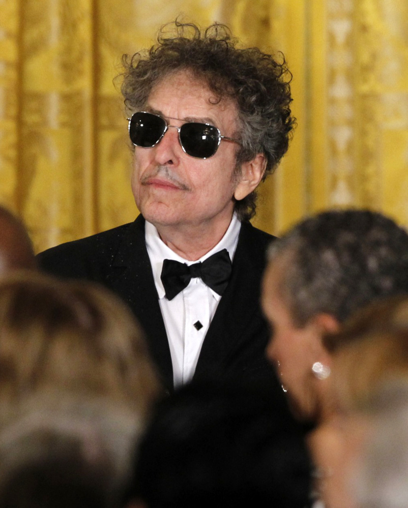 Bob Dylan is being criticized by a Swedish Academy member for his silence after receiving a Nobel Prize.