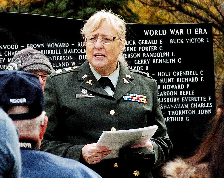 Retired Army Maj. Susan Horsman addresses the crowd. 
