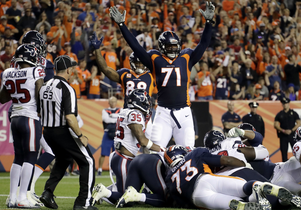 Denver offensive tackle Donald Stephenson, 71, celebrates, thinking Andy Janovich had scored a touchdown. Janovich was short, but the Broncos won 27-9 on Monday in Denver.