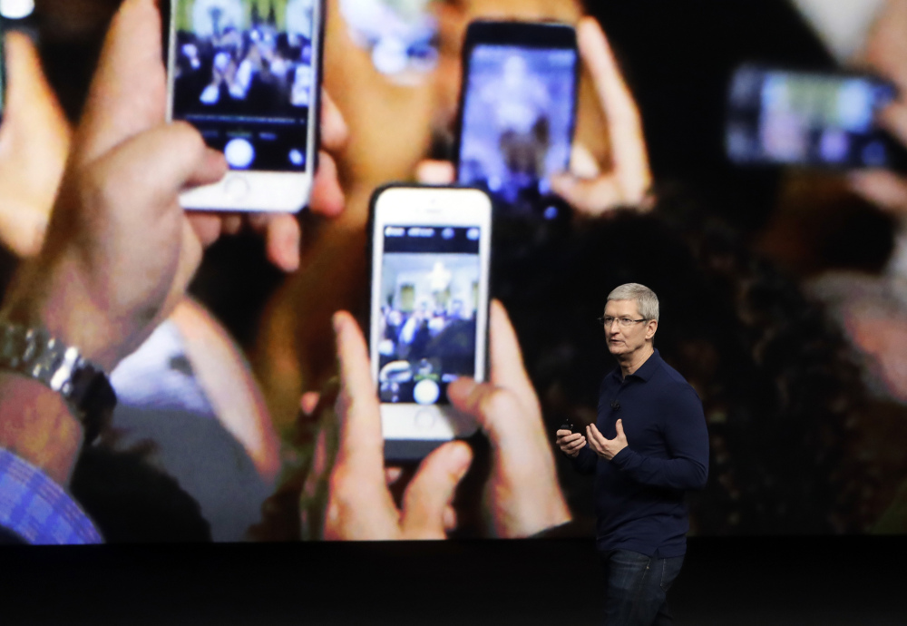 Apple CEO Tim Cook emphasized growth in the company's services section as Apple reported Tuesday that it sold 45.5 million iPhones in the previous quarter, 5 percent fewer than it sold a year earlier.