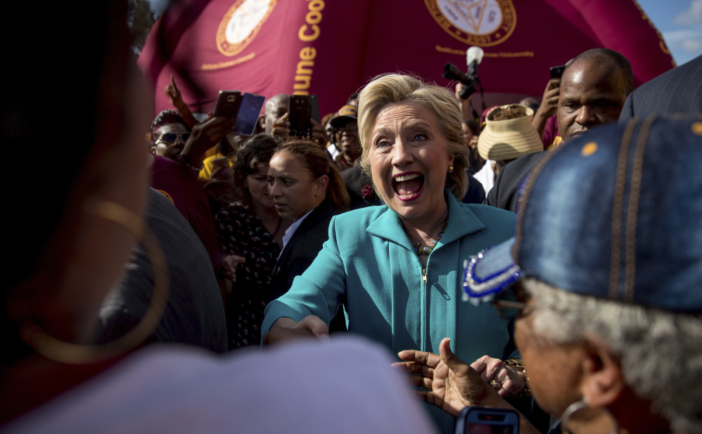 Democratic presidential candidate Hillary Clinton greets people at a homecoming tailgate party for Bethune-Cookman in Daytona Beach, Fla., on Saturday.
