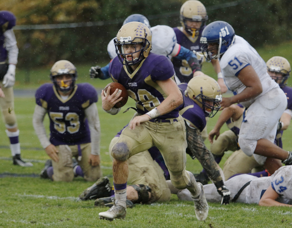 Max Coffin of Cheverus finds some running room beyond the line of scrimmage. Cheverus will travel to Windham for a regional semifinal next weekend.