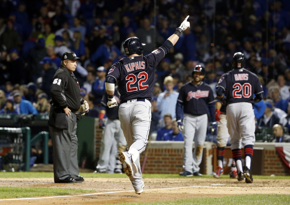 Cleveland Indians' Jason Kipnis celebrates after hitting a three-run home run during the seventh inning of Game 4 of the World Series against the Cubs on Saturday in Chicago.