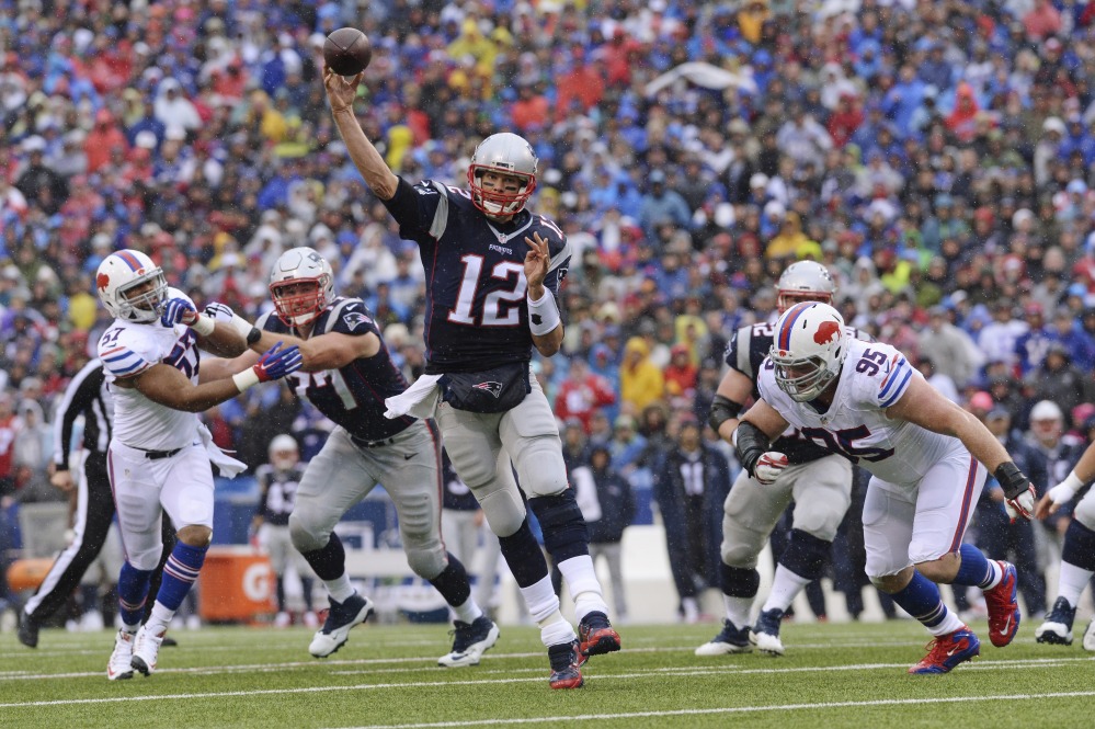Patriots quarterback Tom Brady went 22 of 33 for 315 yards and threw four touchdown passes as New England beat Buffalo 41-25 on Sunday in Orchard Park, New York.