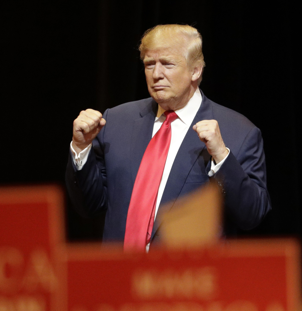 Republican presidential candidate Donald Trump wraps up an appearance at a campaign rally Sunday in Las Vegas.