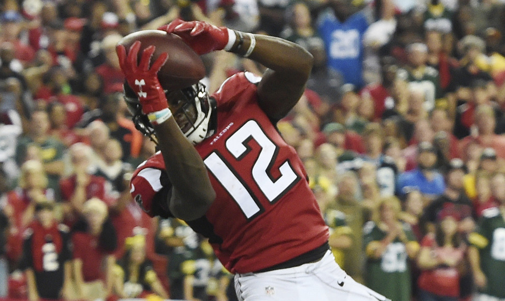 Falcons wide receiver Mohamed Sanu catches an 11-yard pass in the back of the end zone for the winning touchdown Sunday in Atlanta's 33-32 victory over the Green Bay Packers.