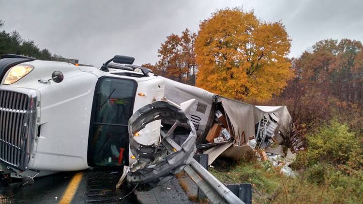 A tractor trailer hauling U.S. mail from Springfield, Mass. to Bangor overturned early Friday morning on Interstate 95 near mile marker 114 northbound in Augusta.  