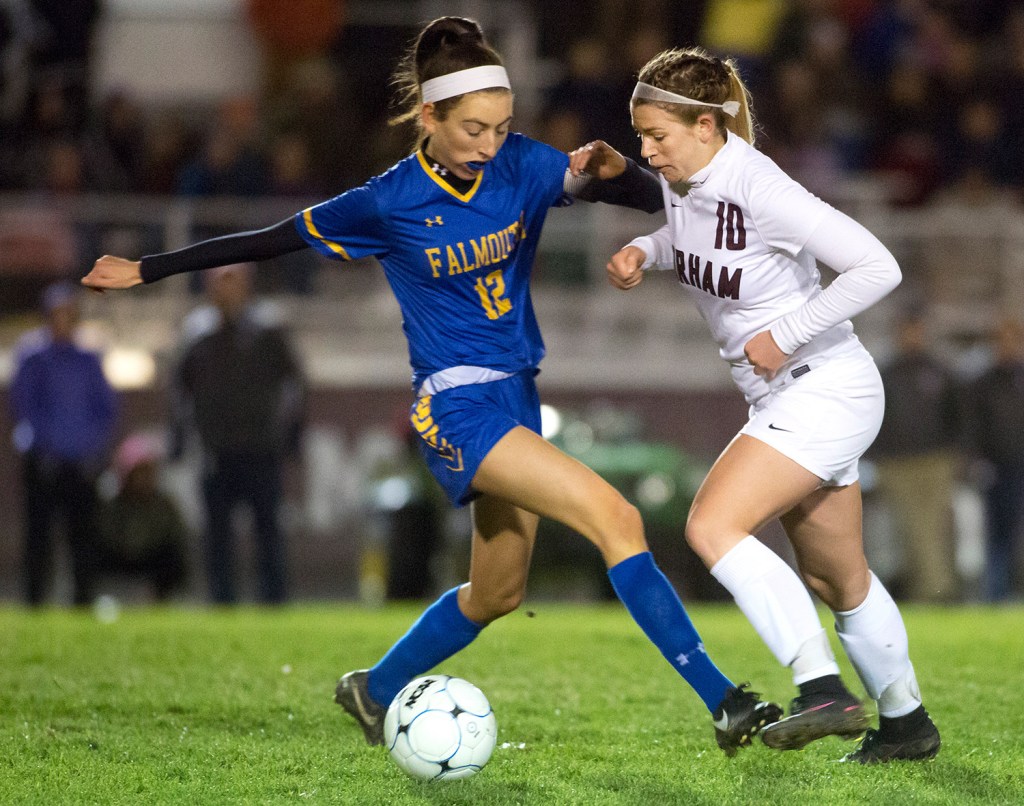 Gorham senior and team captain Meghan Perrin defends against Falmouth senior and team captain Mia Cooney during Monday's Class A South semifinal at Gorham. Gorham won, 2-0, to reach the final.