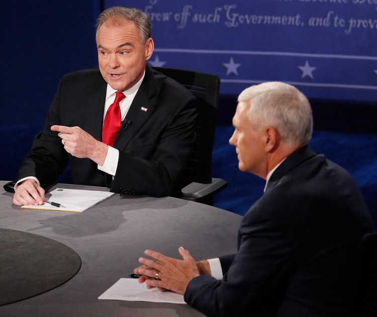 Democratic vice presidential nominee Tim Kaine, left, went on the attack from the start of Tuesday night's debate, pressuring Republican Mike Pence to answer for some of Donald Trump's provocative statements.
Andrew Gombert/Pool via AP