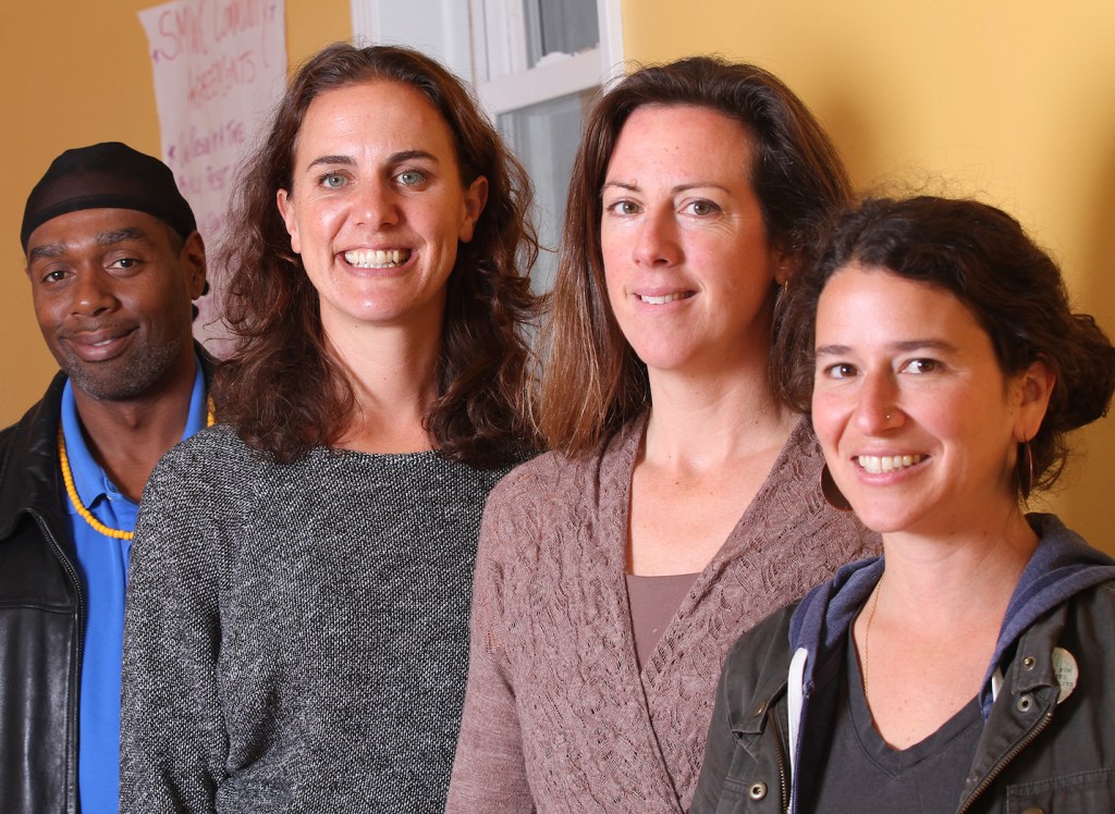 Maine Inside Out’s co-founders and co-directors, from right: Margot Fine, Tessy Seward and Chiara Liberatore. At left is Joseph Jackson, who with Abdulkadhir Ali is a part-time MIO staffer. They are community group facilitators. (Staff photo by Melanie Sochan)