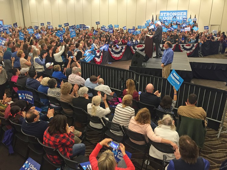 Sen. Bernie Sanders addresses a crowd of supporters on behalf of Hillary Clinton's presidential campaign at the Cross Insurance Center in Bangor on Friday.<em>Brianna Soukup</em>