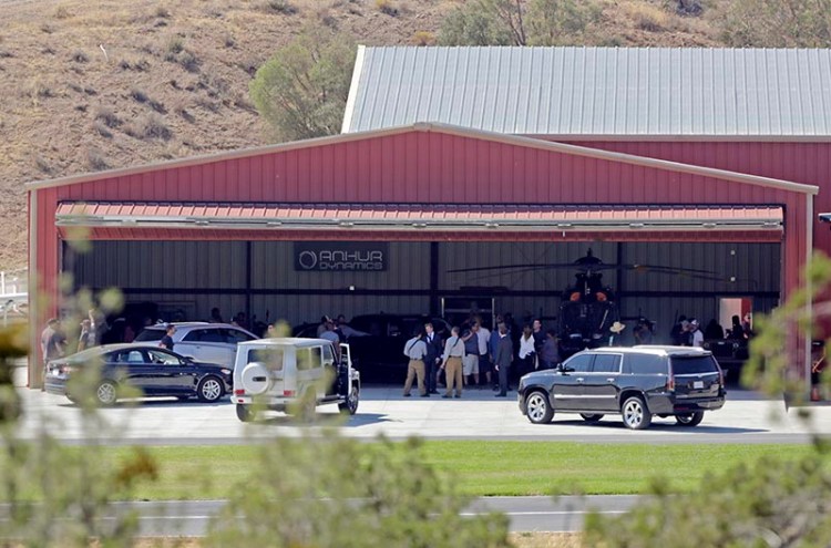 Members of a film crew gather at Agua Dulce Airpark in Agua Dulce, Calif., where stuntman Steve de Castro was injured on July 6.