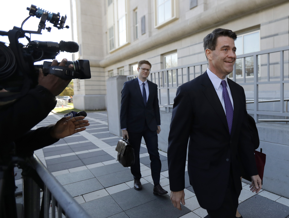 Bill Baroni, right, New Jersey Gov. Chris Christie's former top appointee at the Port Authority of New York and New Jersey, arrives at Martin Luther King, Jr., Federal Court Friday in Newark, N.J.