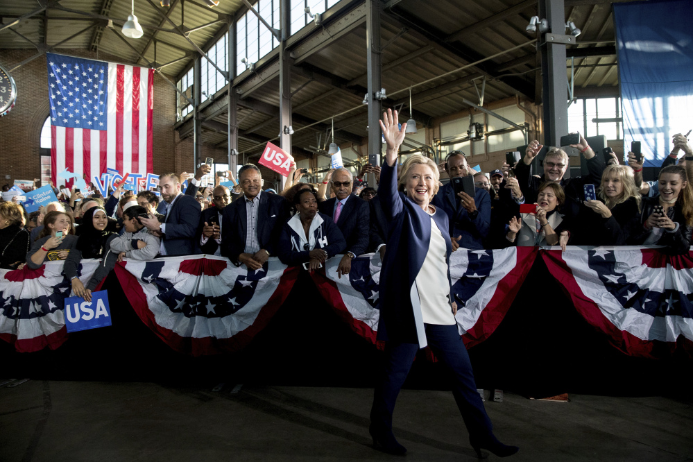 Democratic presidential candidate Hillary Clinton arrives to speak at a rally at Eastern Market in Detroit, Friday, Nov. 4, 2016. (AP Photo/Andrew Harnik)