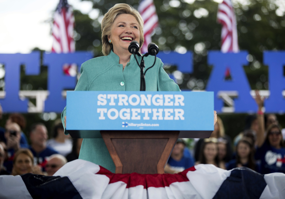 Hillary Clinton pauses while speaking at a rally at C.B. Smith Park in Pembroke Pines, Fla., on Saturday.