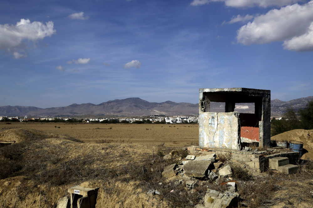 An abandoned Cypriot guard post which was being used by the military, stands on the outskirts of the Turkish Cypriot breakaway north part of the divided capital Nicosia in the eastern Mediterranean island of Cyprus, Sunday, Nov. 6, 2016. Past efforts to solve the ethnical division of Cyprus have failed, but the leaders are heading to the Swiss resort of Mont Pelerin for meetings next week that could be the precursor to one last summit to sort out the final details of a deal.