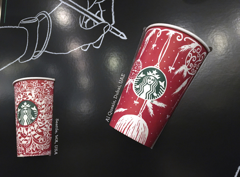 Thirteen different holiday cups will hit Starbucks stores around the world Thursday. Now President-elect Donald Trump had suggested boycotting the chain last year.