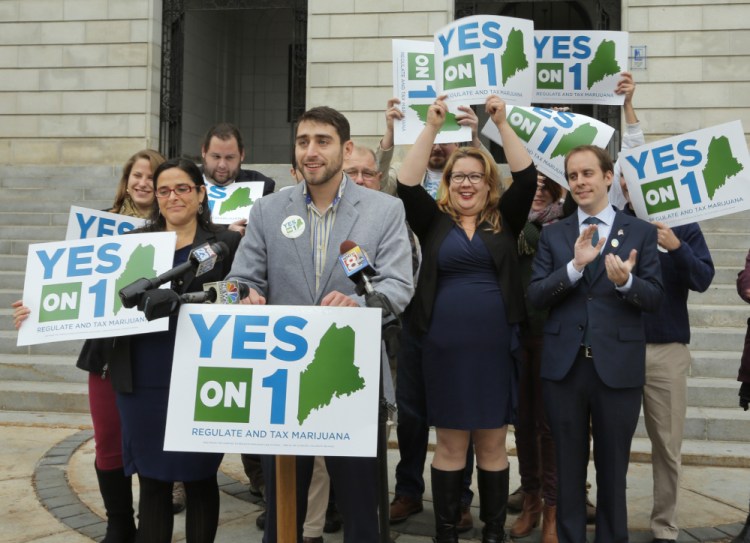 Backers of the marijuana legalization referendum claim a win during a news conference Wednesday at Portland City Hall but 4,000 absentee votes still must be counted.
