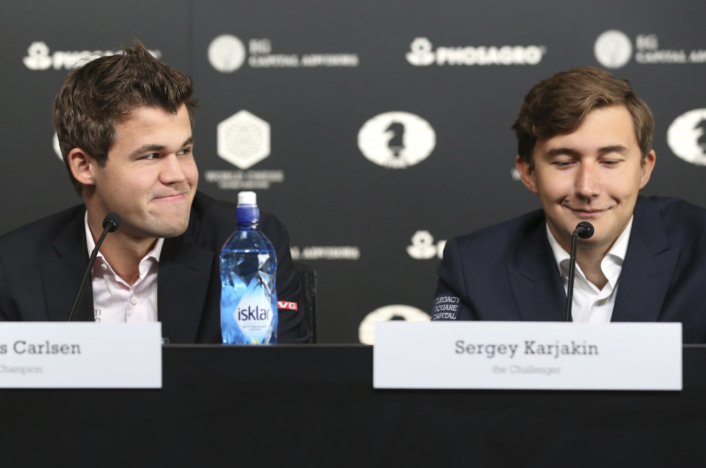 Magnus Carlsen of Norway, left, will defend his title against challenger Sergey Karjakin of Russia when the two face off Thursday in the World Chess Championship in New York.